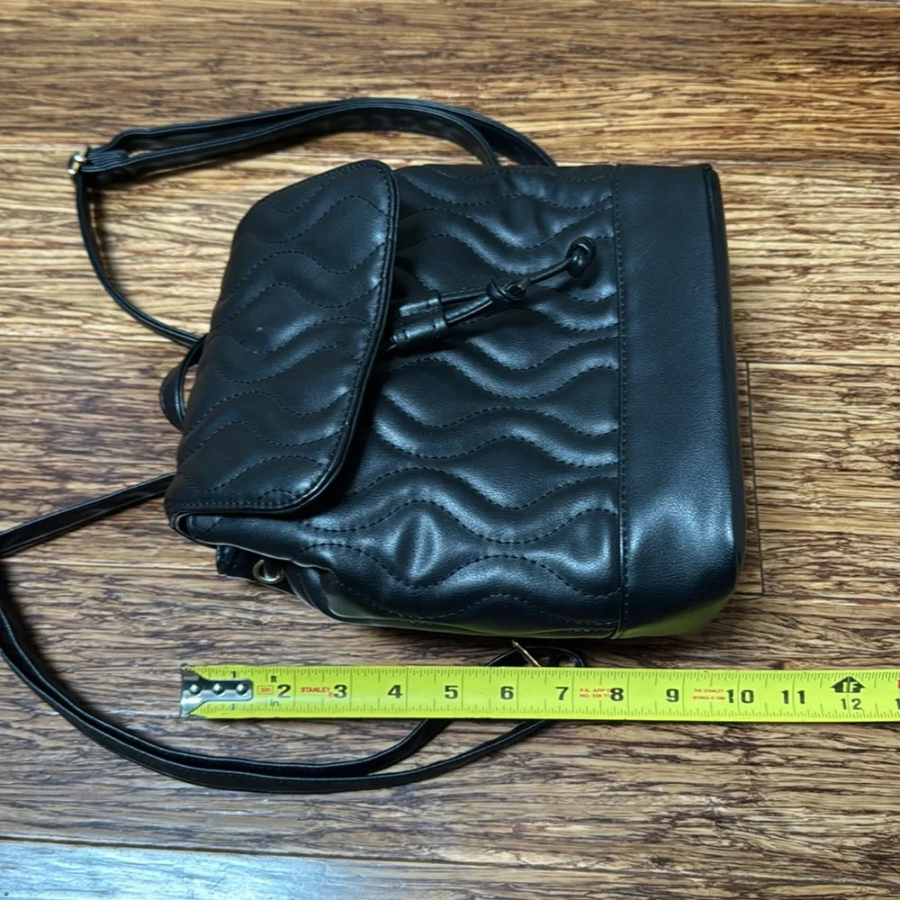 Alexis Bendel black quilted vegan leather adjustable backpack